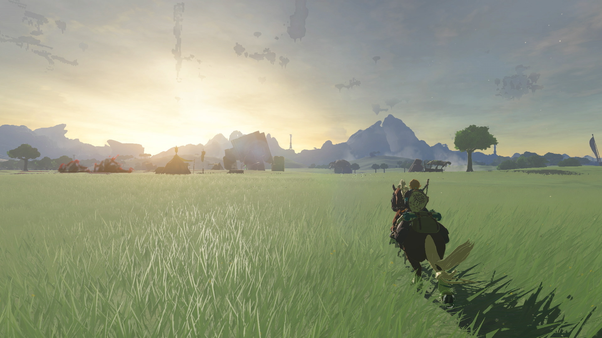 Link riding a horse across a field in The Legend of Zelda: Tears of the Kingdom.