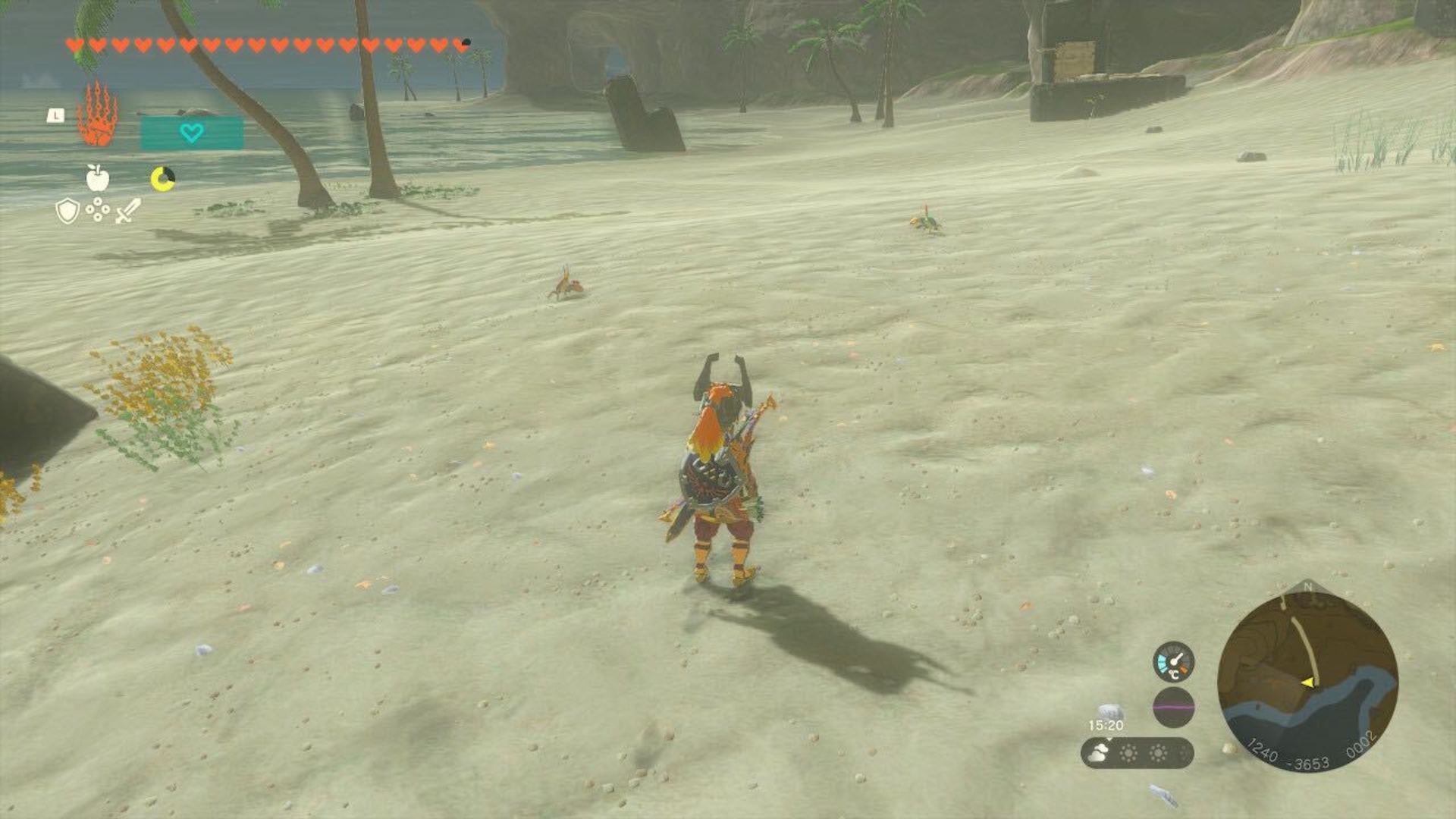 Link standing on a beach near some Razorclaw Crabs in Tears of the Kingdom