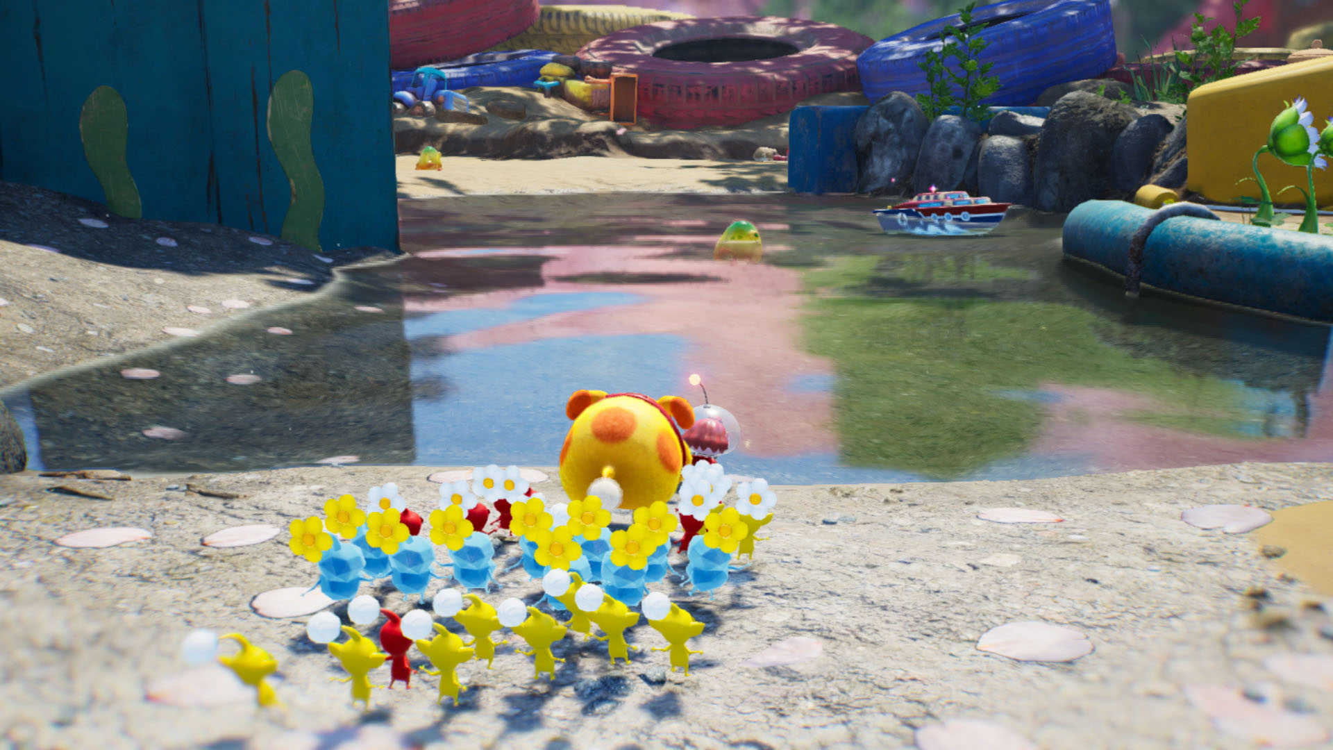 Oatchi and Pikmin looking at a body of water in Pikmin 4.