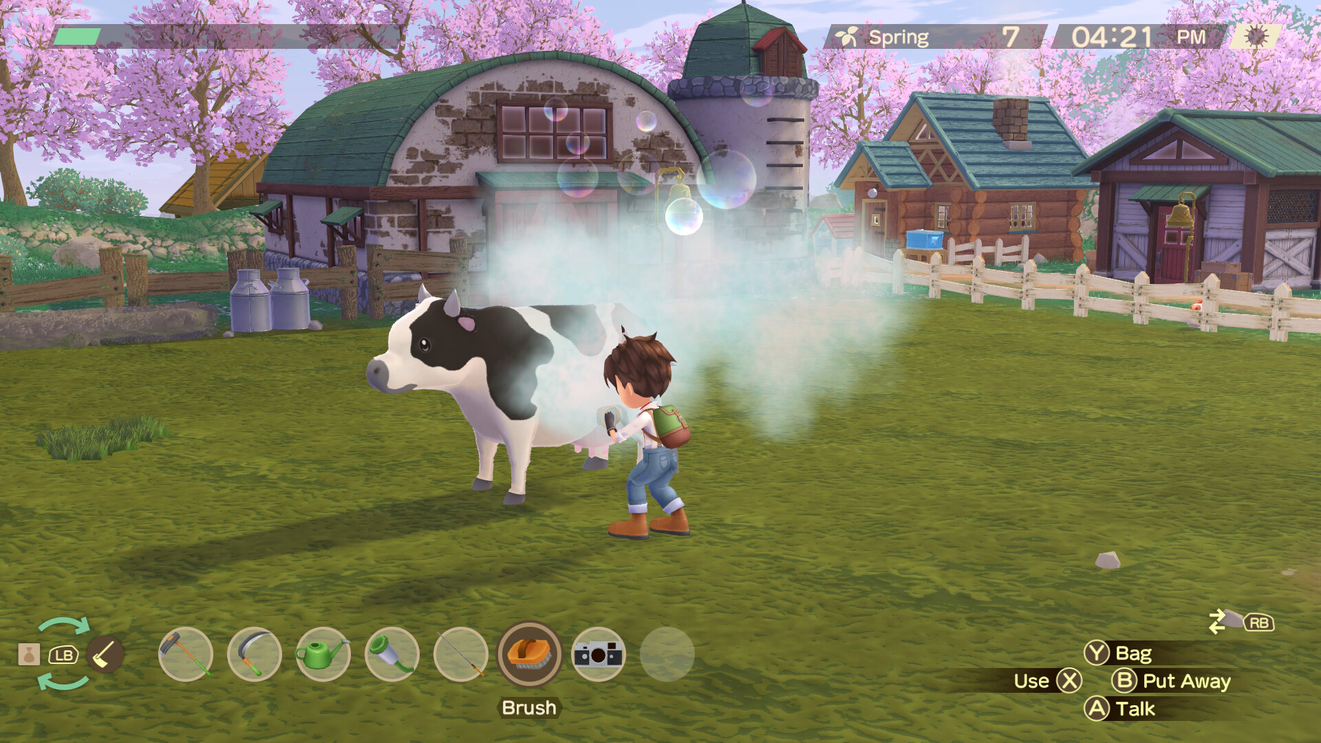 A player milking the cow with a milker in Story of Seasons A Wonderful Life.